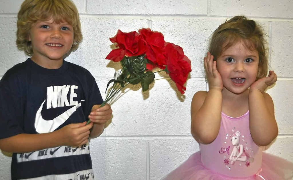 Kye Lawler gives Olivia King a bunch of roses for Valentine’s Day. Kye Lawler gives Olivia King a bunch of roses for Valentine’s Day.